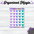 A sheet of thirty planner stickers featuring watercolor butterfly designs in purple, pink, blue, and teal, displayed on a white wood background with decorative branding text.