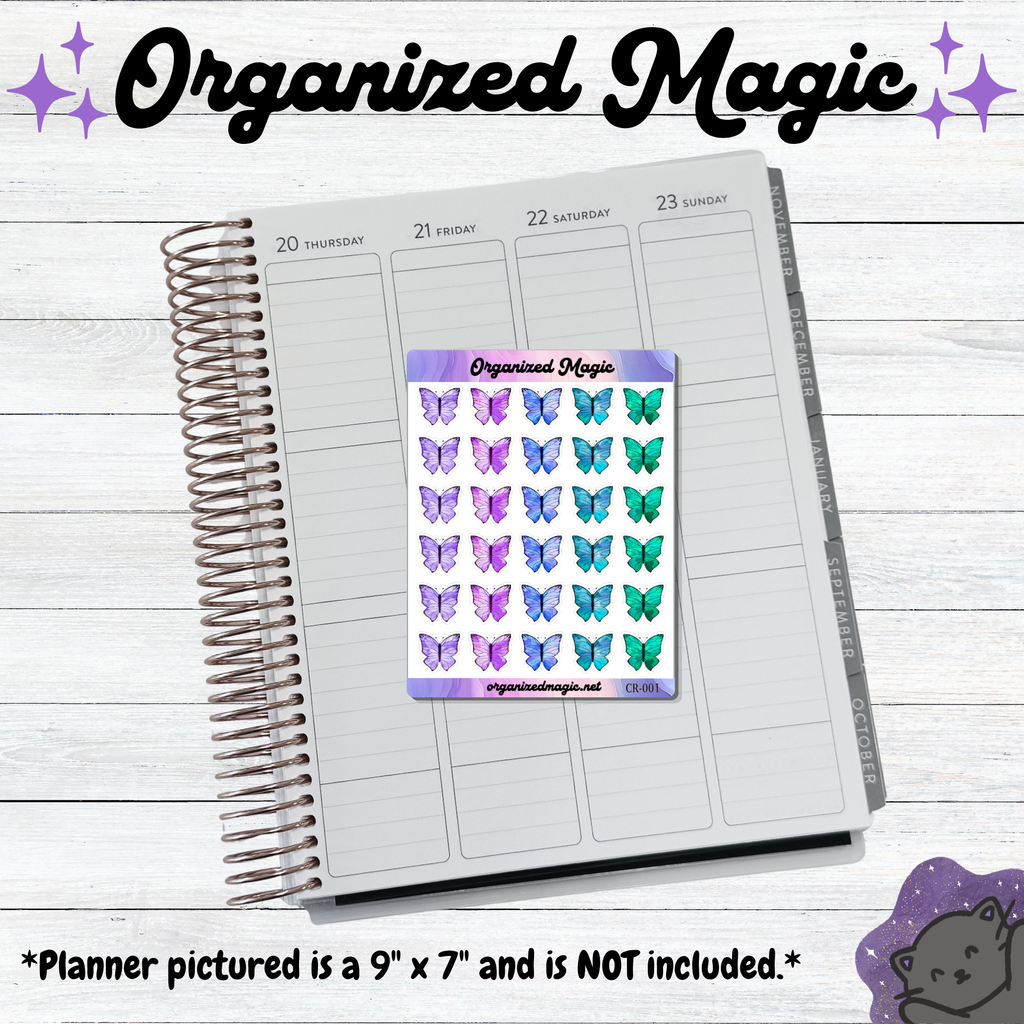 A weekly planner page with a sticker sheet of colorful butterfly stickers placed on top. The sticker sheet reads 'Organized Magic' and shows purple, lavender, and teal butterflies. Planner pictured is not included.
