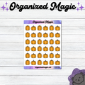 A sticker sheet featuring thirty-six small orange pumpkin doodle illustrations arranged in a grid. The top header reads Organized Magic, and the bottom footer includes the text organizedmagic.net and the code SEAS-009.