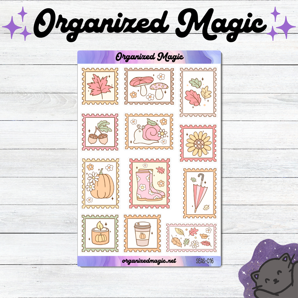 A sheet of planner stickers with autumn-themed illustrations including leaves, mushrooms, acorns, a snail, rain boots, a pumpkin, an umbrella, and a candle, displayed on a white wood background with decorative text and a cat illustration.
