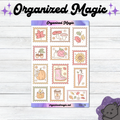 A sheet of planner stickers with autumn-themed illustrations including leaves, mushrooms, acorns, a snail, rain boots, a pumpkin, an umbrella, and a candle, displayed on a white wood background with decorative text and a cat illustration.