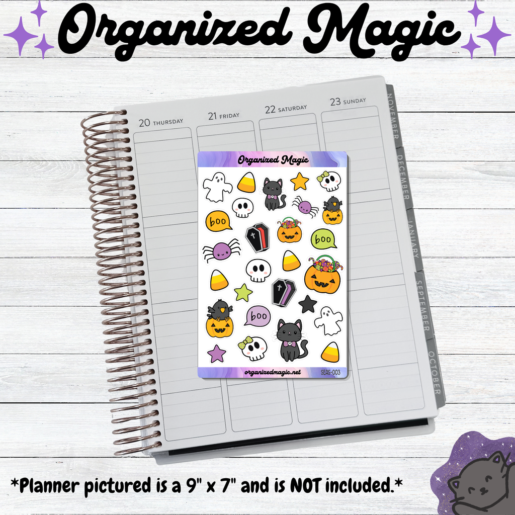 A sheet of colorful Halloween planner stickers displayed on an open spiral planner page. The stickers feature cute spooky illustrations including pumpkins, ghosts, skulls, bats, candy corn, and spiderwebs.