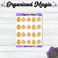 A sheet of planner stickers featuring orange jack-o'-lantern pumpkins with various carved faces, displayed on a white wood background with 'Organized Magic' branding at the top.