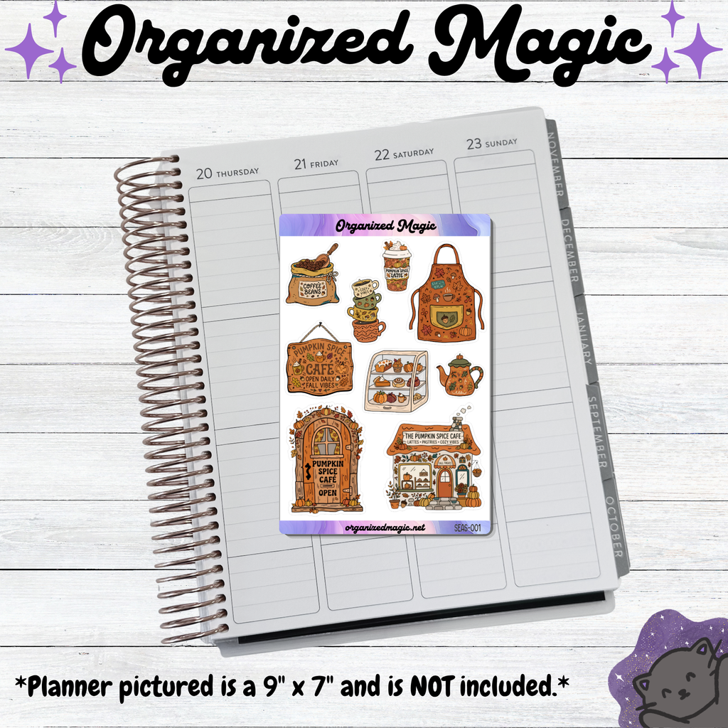 A spiral-bound planner page shown on a whitewashed wood background, with a sticker sheet featuring coffee-themed illustrations placed on the page. The sticker sheet is branded 'Organized Magic' and includes drawings of a coffee shop, apron, mug, and other coffee accessories.