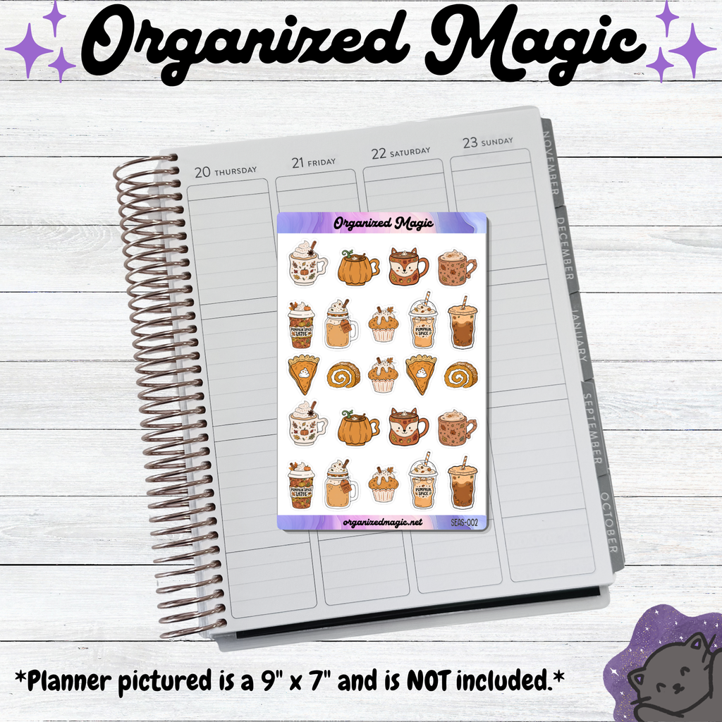 A sticker sheet titled Organized Magic featuring autumn-themed illustrations of pumpkin-shaped mugs, fox-faced cups, coffee drinks, pumpkin pie slices, and cupcakes. The sheet is displayed on an open planner and includes the text Organized Magic and organizedmagic.net.
