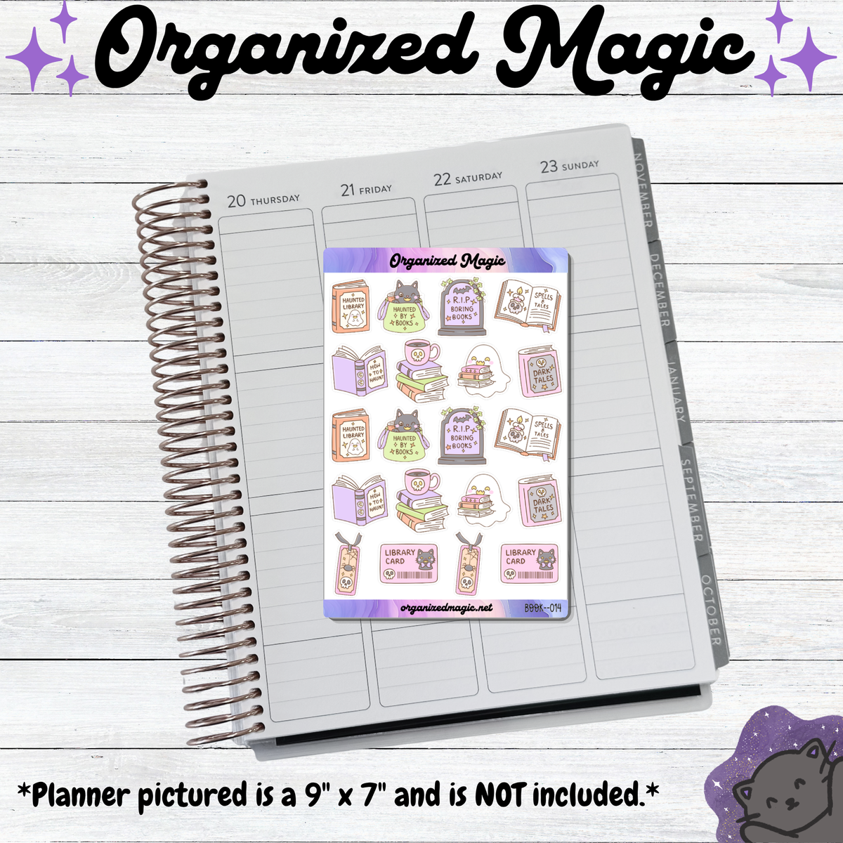 A spiral-bound planner page is shown on a whitewashed wood background, with a sheet of decorative planner stickers placed on top. The stickers feature cute doodle illustrations of books, black cats, and ghosts.